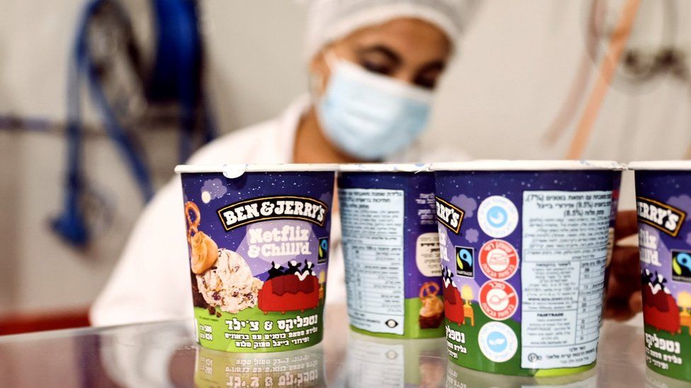 Tubs of Ben & Jerry's ice cream are seen at a factory in Be'er Tuvia, Israel (20 July 2021)