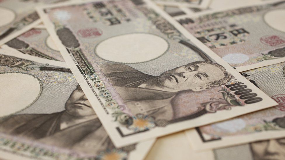 10,000 Japanese yen bills (stock photo)