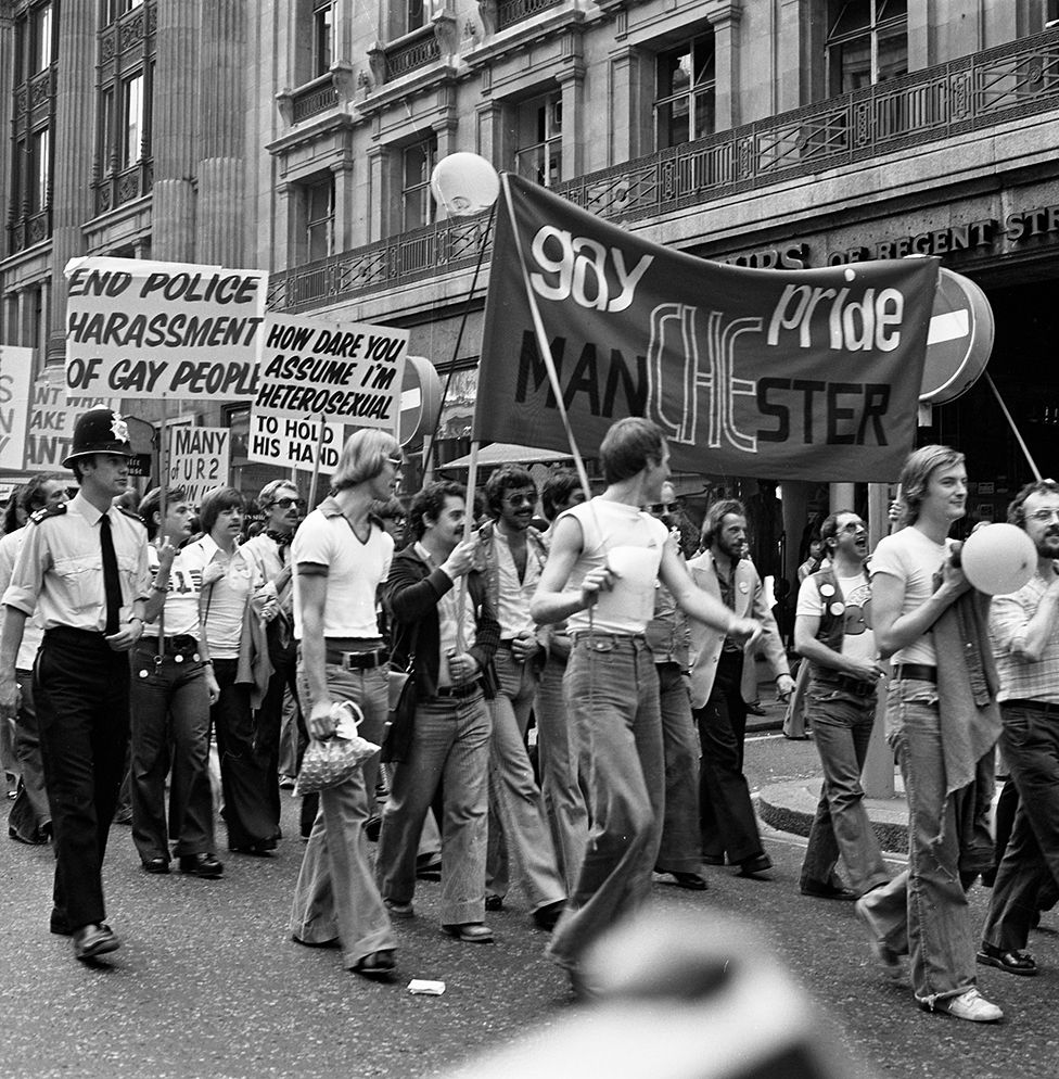 People attend the Pride march in 1976