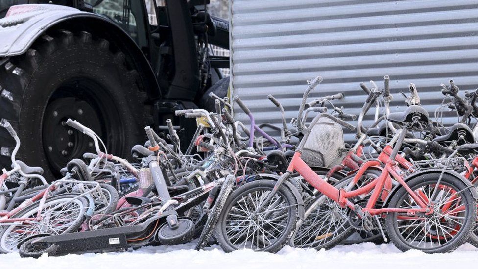 Abandoned bicycles are pictured at the international border crossing at Salla,