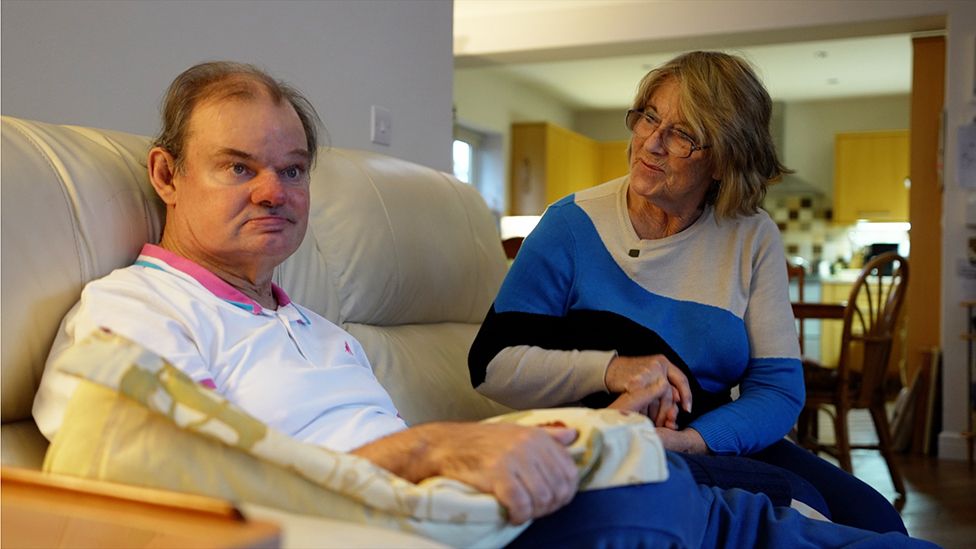 Andrew and Margaret on the sofa at home