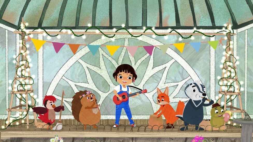 A screenshot of Yukee playing her ukulele with other musical animals