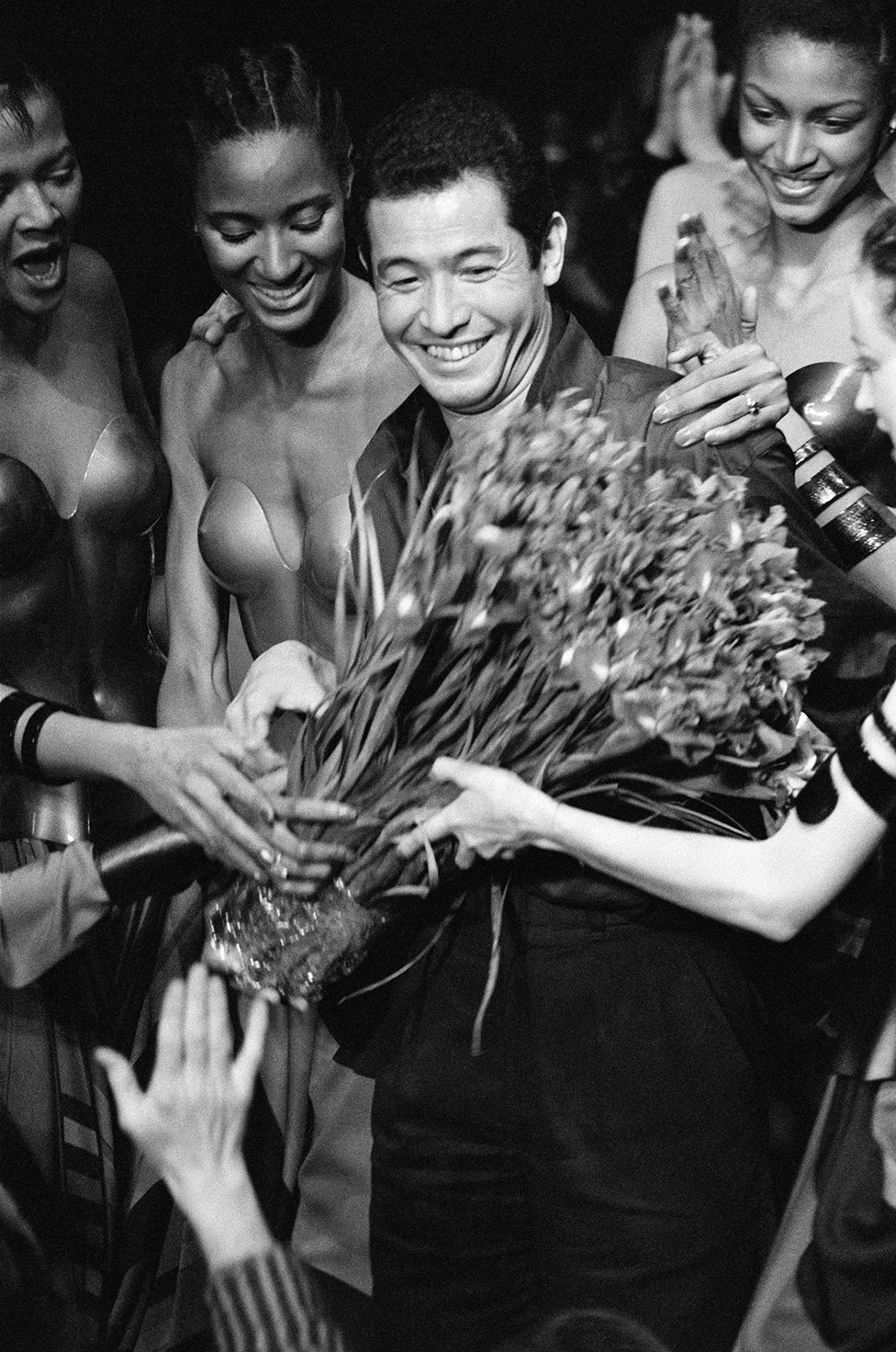 Issey Miyake and models during his Ready-to-Wear, Fall-Winter 1980-81 collection show in Paris, France
