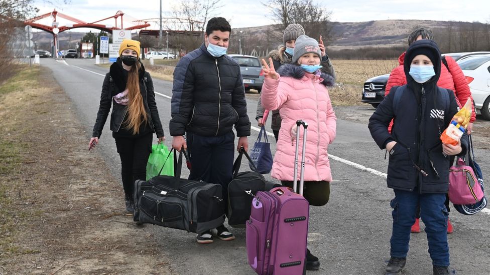 A family of Ukrainian refugees at the Hungarian border