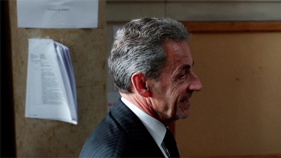 Nicolas Sarkozy, profile, leaving court