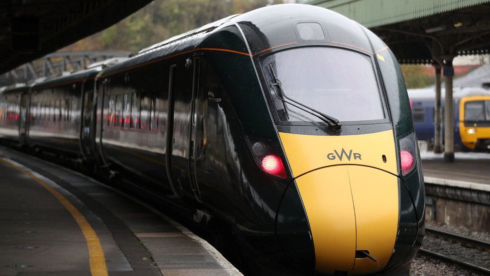 A GWR train in a station photographed from the front