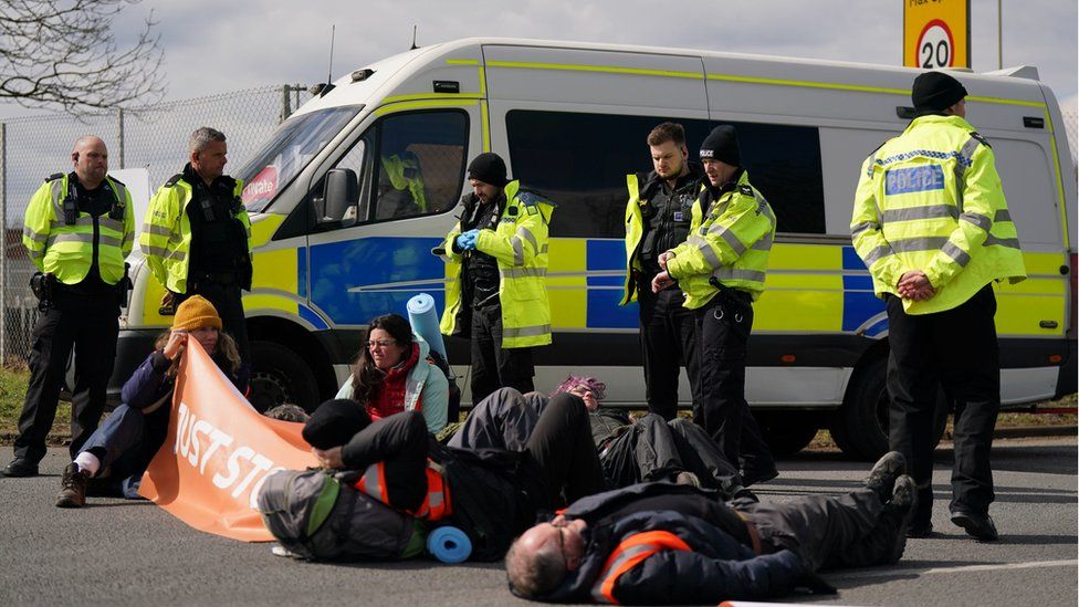 Activists from Just Stop Oil take part in a blockade at the Kingsbury Oil Terminal, Warwickshire
