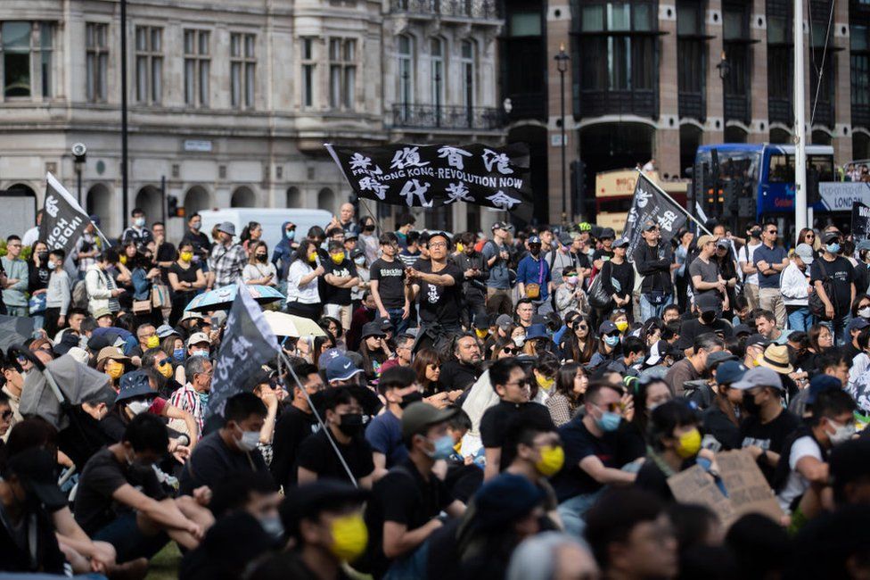Pro-democracy demonstrators gather at Parliament square in London to mark the third anniversary of the start of massive pro-democracy protests which roiled Hong Kong in 2019 Organisers claimed about four thousands attended the rally.