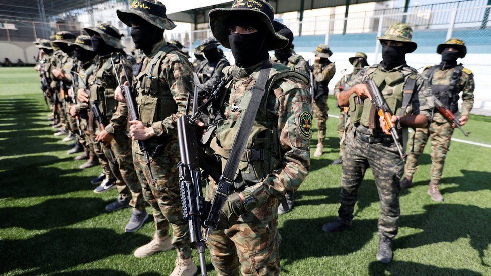 Palestinian Islamic Jihad militants gather at a mourning house for Palestinians who were killed during Israel-Gaza fighting, as a ceasefire holds, in Rafah in the southern Gaza Strip August 8, 2022