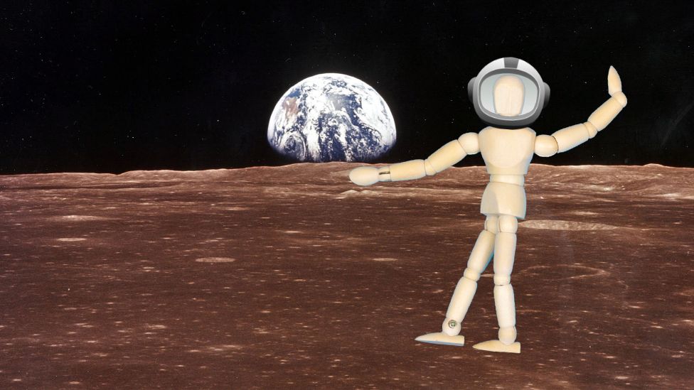 An art mannequin superimposed on the moon