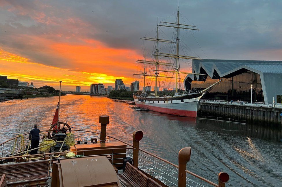The Waverley passes the Tallship Glen Lee and the Riverside Museum in Glasgow