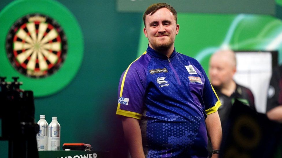 Luke Littler reacts after victory over Rob Cross (not pictured) on day fifteen of the Paddy Power World Darts Championship at Alexandra Palace,