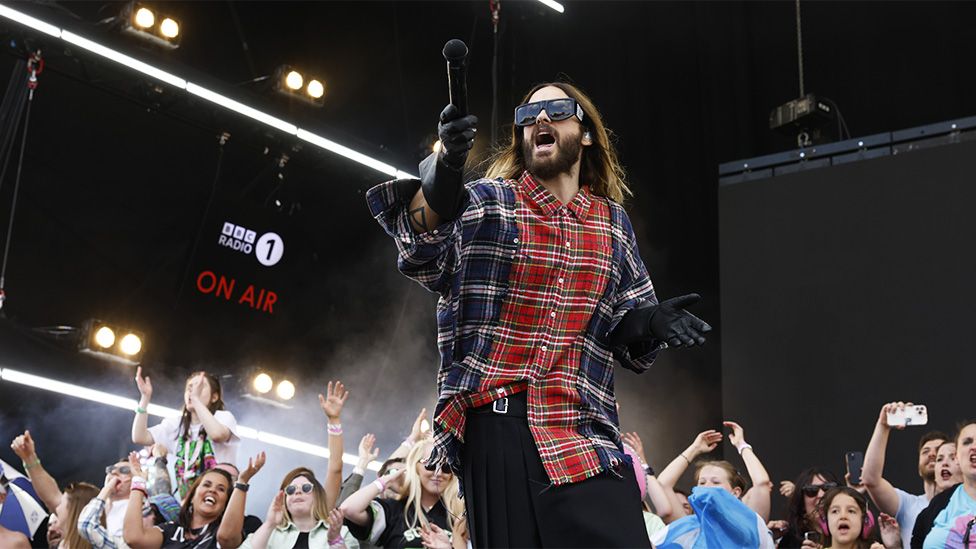 Thirty Seconds to Mars on stage with fans