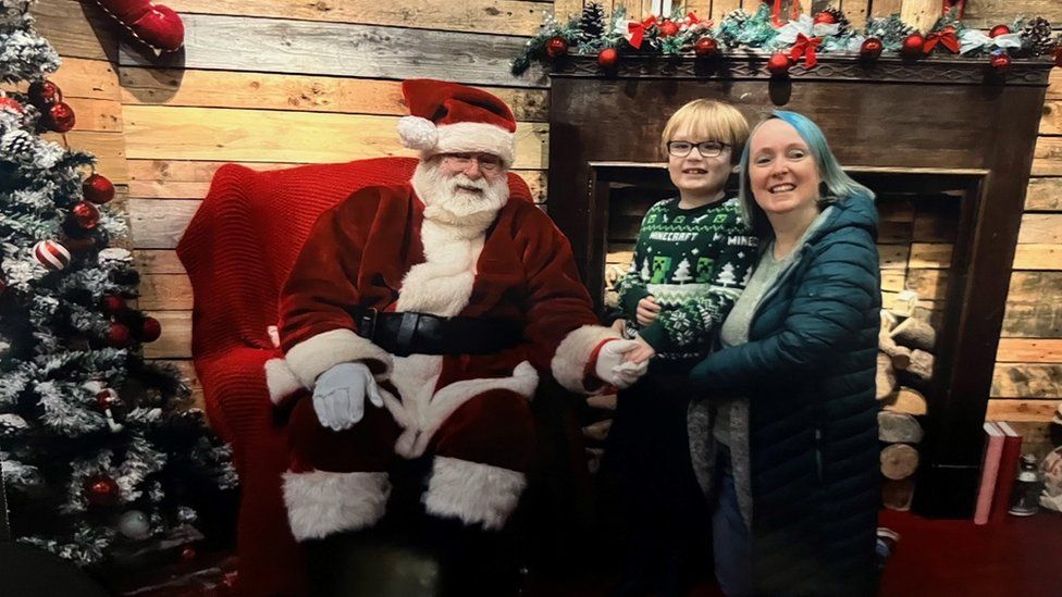 Milo and Helen visiting Santa