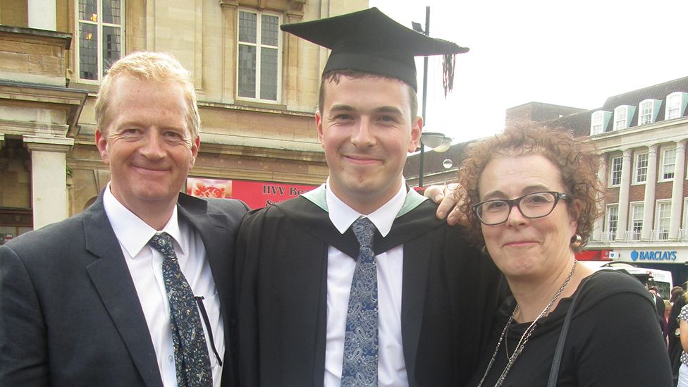 Jack Ritchie and his parents at his graduation ceremony