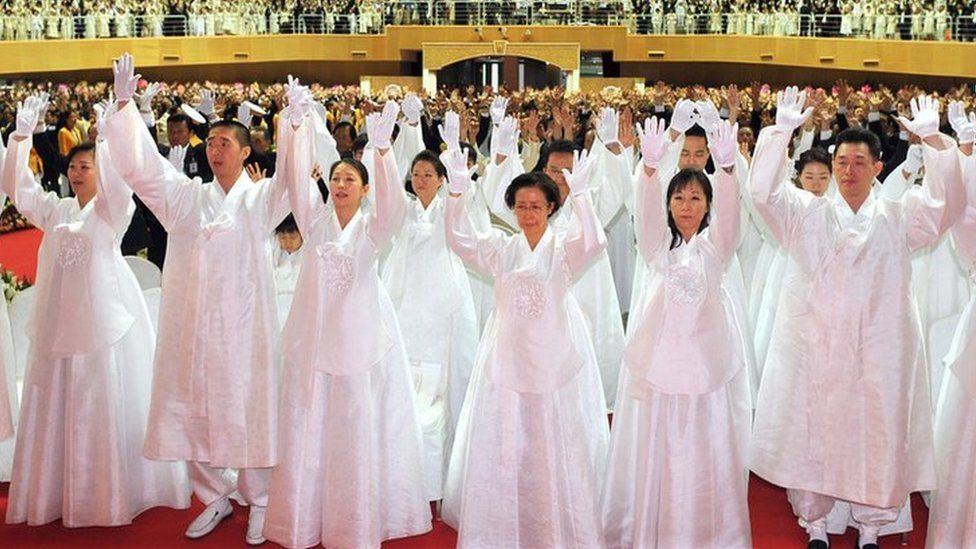 Unification Church members at the funeral of their founder Sun Myung Moon
