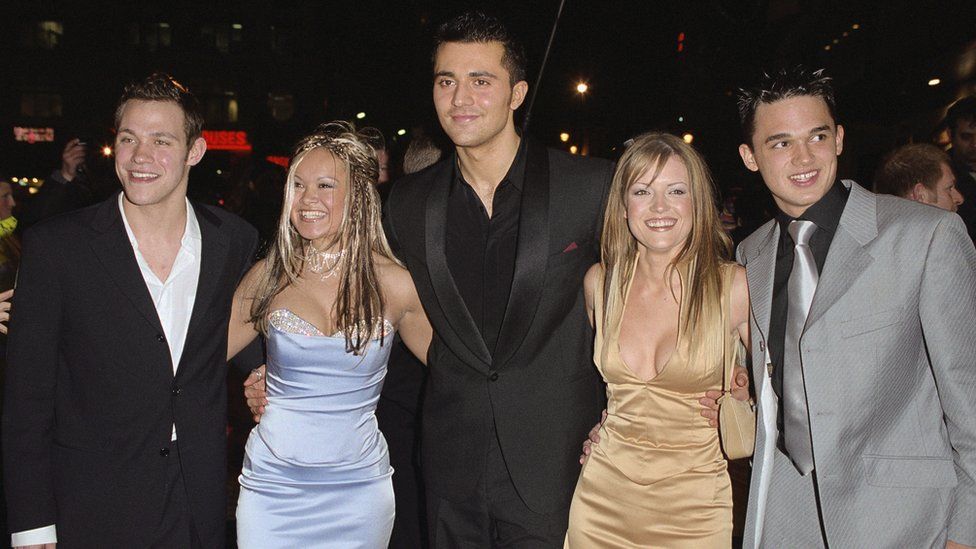 The five finalists on the 2001-2002 television program Pop Idol (left to right): Will Young, Zoe Birkett, Darius Danesh, Hayley Evetts, and Gareth Gates