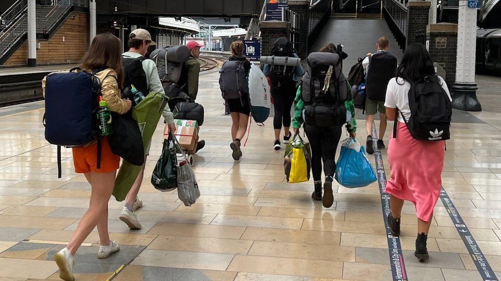 Festival-goers at London's Paddington Station on Thursday morning