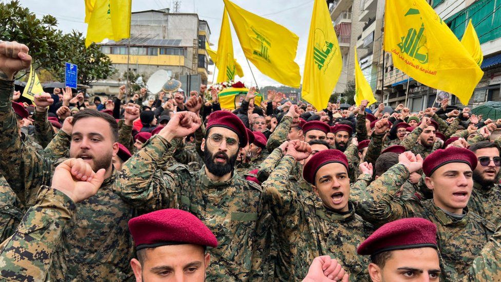 Hezbollah militants and supporters attend the funeral of a commander killed in an Israeli strike in Lebanon's southern city of Nabatieyh on February 16, 2024.