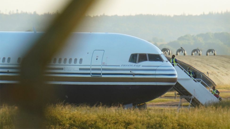 A Boeing 767 aircraft at MoD Boscombe Down, which is believed to be the plane set to take asylum seekers from the UK to Rwanda, on 14 June 2022