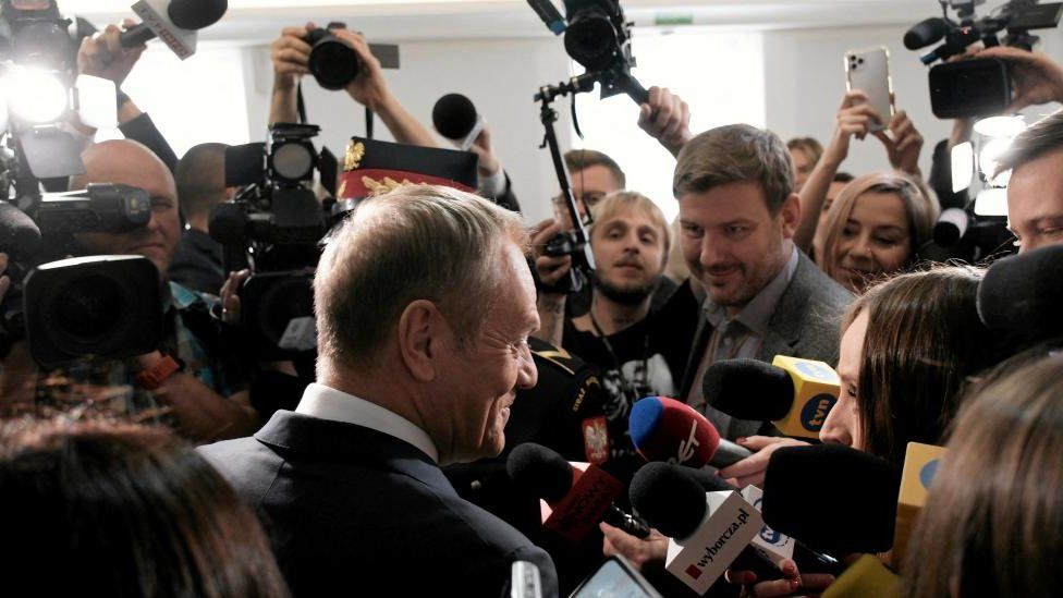 Donald Tusk speaks with members of the media on the day Poland's opposition parties sing the coalition agreement, in Warsaw, Poland on 10 November 2023.