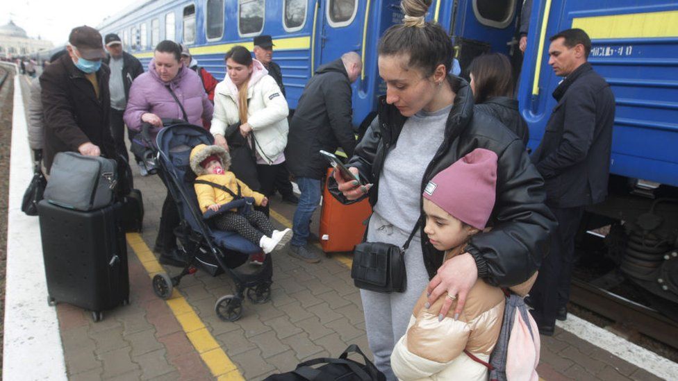 People leaving from Odessa railway station in Ukraine on 29 March