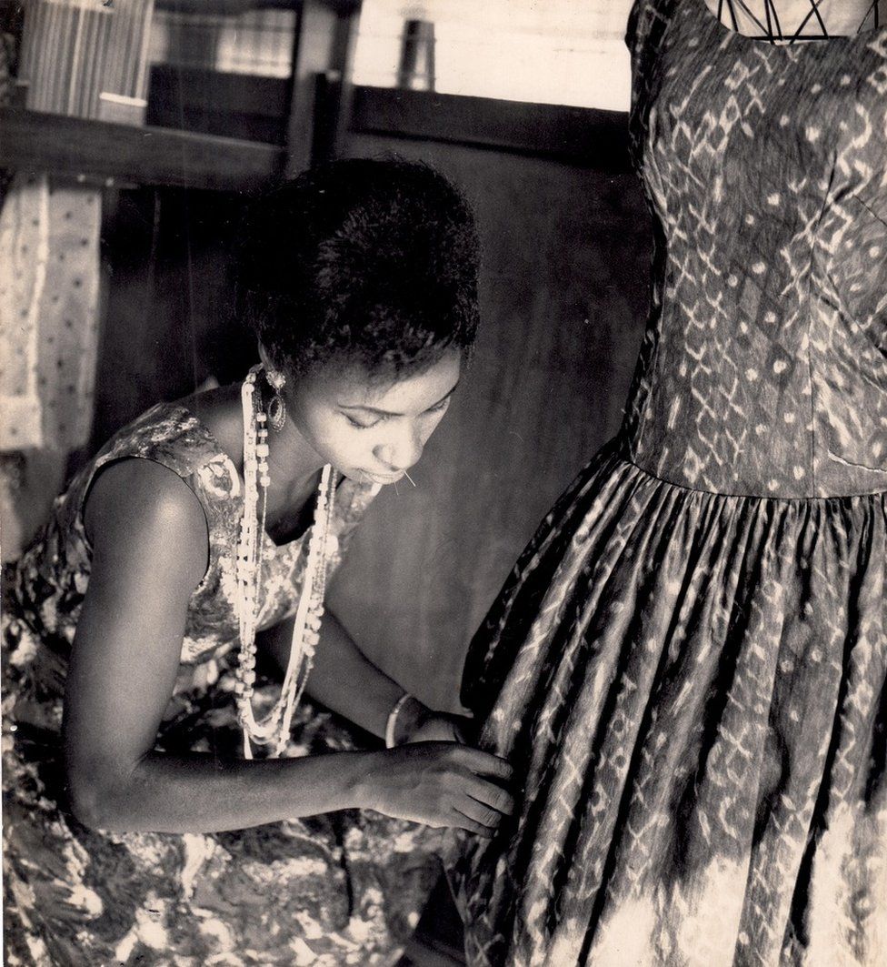 Woman working on a dress