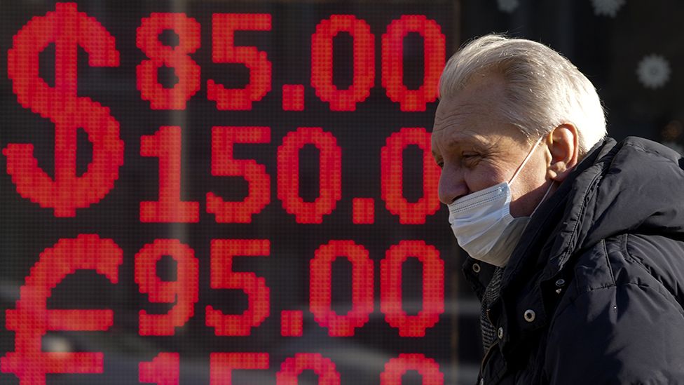 A sign board displays exchange rates in Moscow, Russia as Russian attacks on Ukraine continue on its fifth day on February 28, 2022. Due to Russian attacks on Ukraine, many countries began to impose sanctions on the Russian economy.
