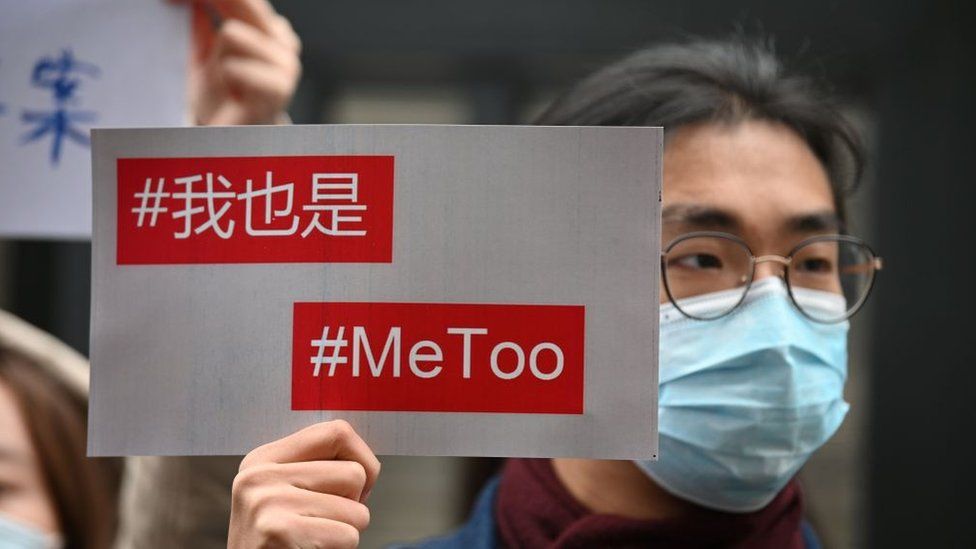 Supporters of Zhou Xiaoxuan, a feminist figure who rose to prominence during Chinas #MeToo movement two years ago, display posters outside the Haidian District Peoples Court in Beijing on December 2, 2020, in a sexual harassment case against one of China's best-known television hosts.