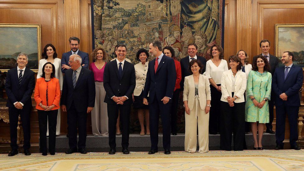 Spain's new cabinet members stand with King Felipe during a swearing-in ceremony at the Zarzuela Palace outside Madrid, Spain, June 7, 2018