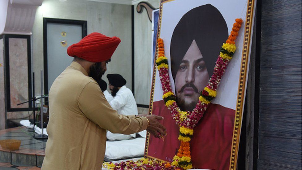 Congress leader Charan Singh Sapra pays homage to Indian singer late Shubhdeep Singh Sidhu, popularly known as Sidhu Moose Wala, during a prayer meeting organised by Punjabi Global Foundation at the Gurudwara, Four Bungalows, Andheri, on June 7, 2022 in Mumbai, India.