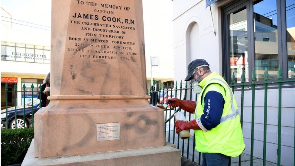 Protesters scrawled graffiti on a statue of Capt Cook in Sydney