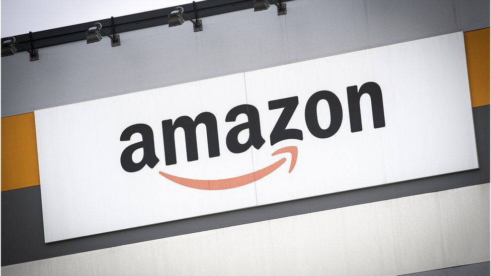 An Amazon logo on a warehouse