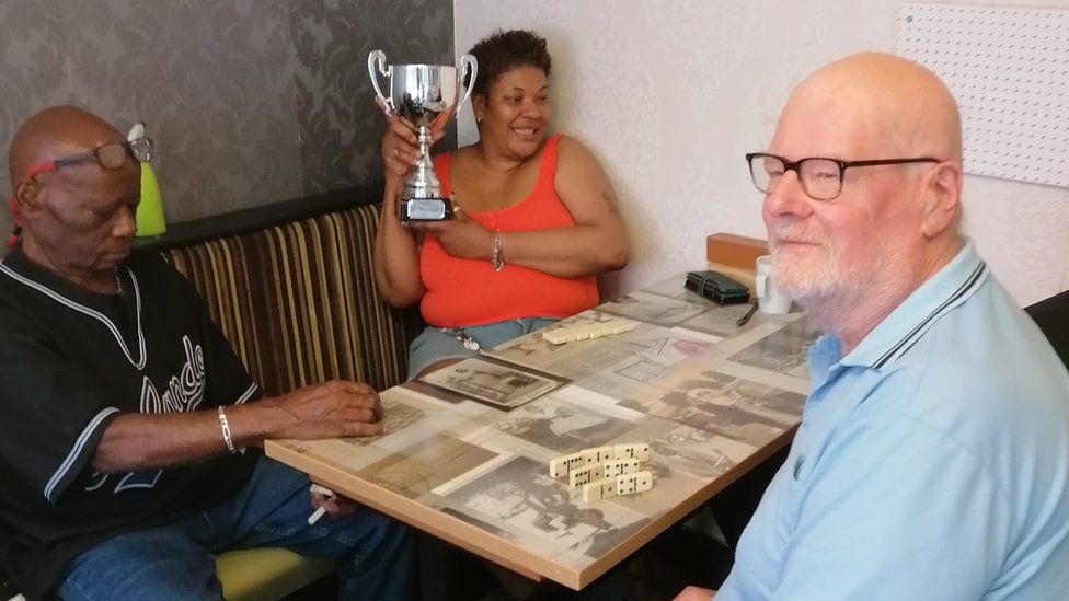 Players of the Colchester Caribbean Elders team who are holders of the Black History Month dominoes trophy