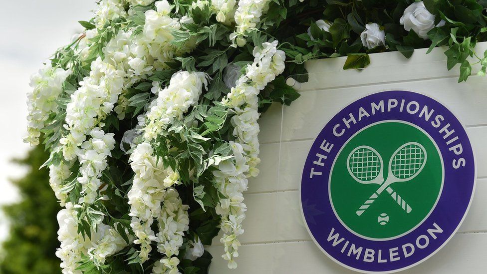 wimbledon logo surrounded by flowers