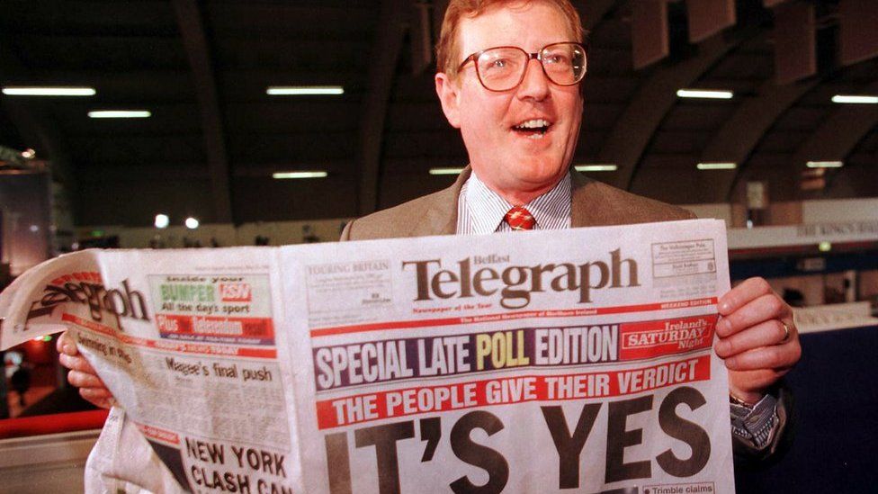 David Trimble holds a copy of the Belfast Telegraph after the result of the referendum on the Good Friday Agreement