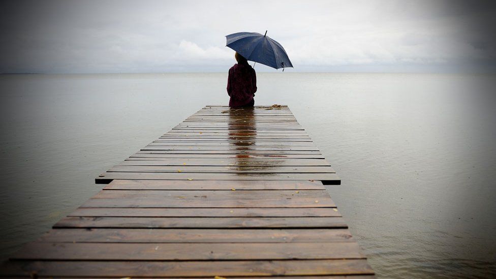 Person on jetty