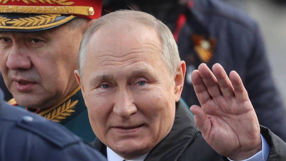 President Putin waving at Moscow Victory Day parade