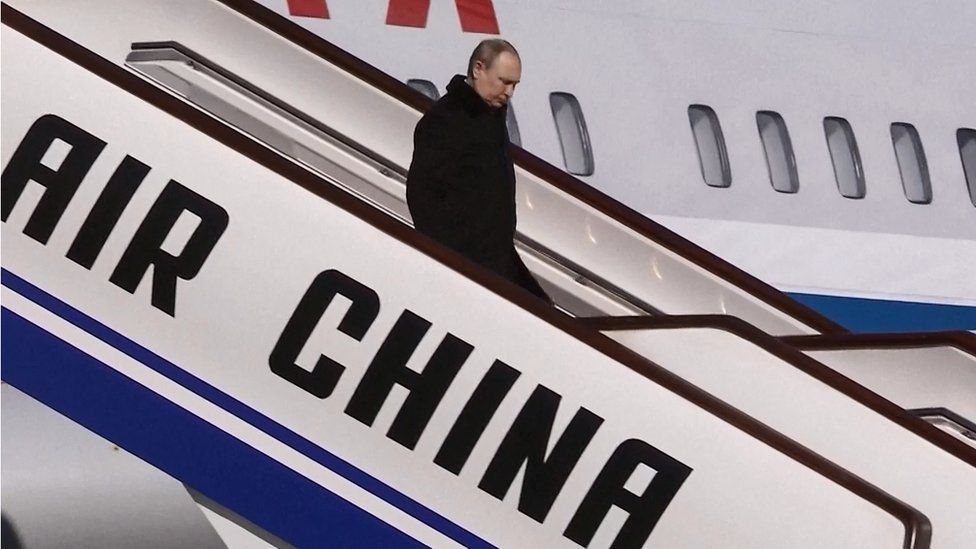 Russia's President Vladimir Putin disembarking upon his arrival in Beijing