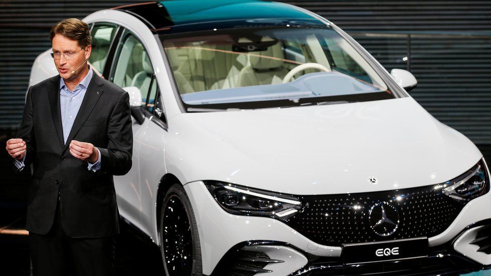 Ola Källenius with the new Mercedes EQE electric car