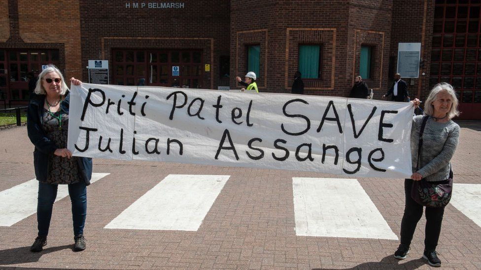 Two women protest for Julian Assange's release outside Belmarsh Prison