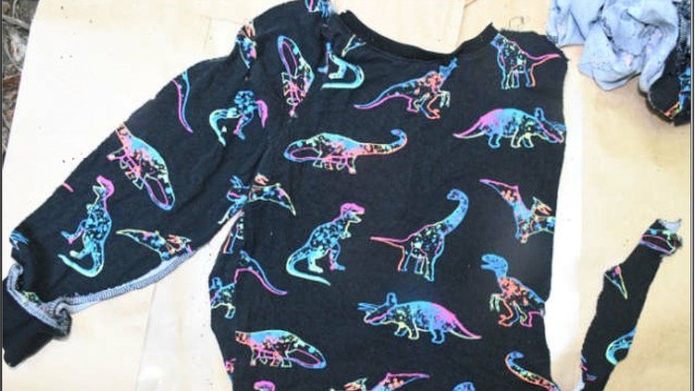 A dinosaur pyjama top recovered at the scene