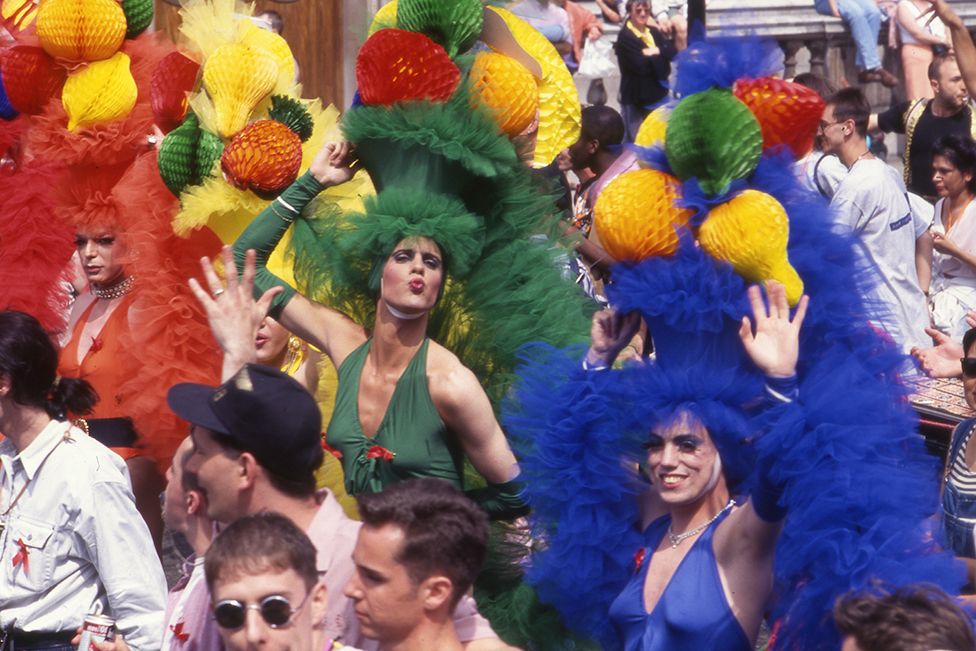 People attend the Pride march in 1994