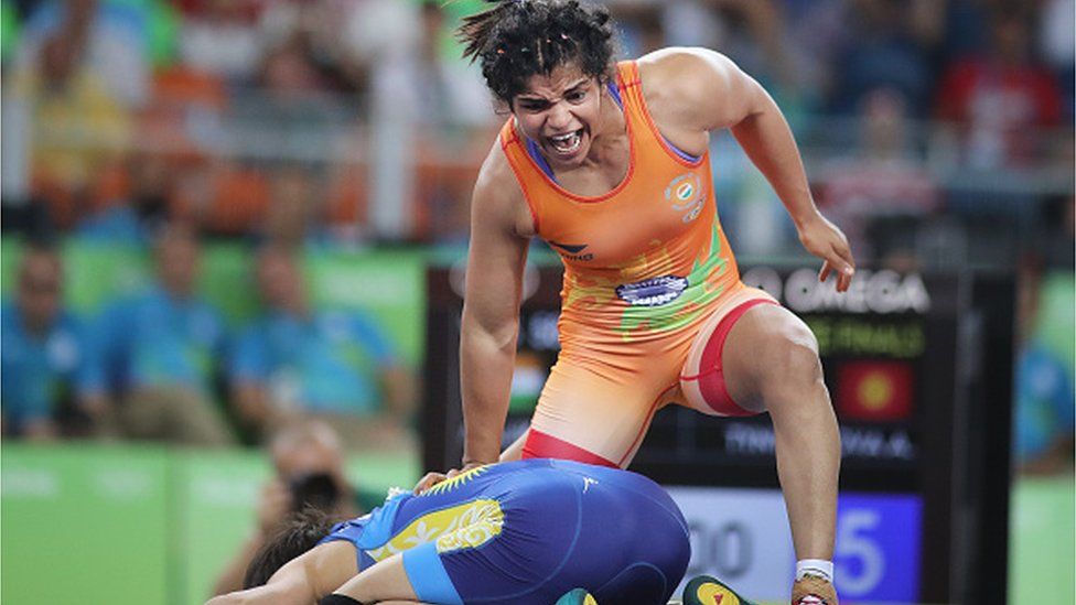 Sakshi Malik of India celebrates victory against Aisuluu Tynybekova of Kyrgyzstan during their Women's Freestyle 58 kg Bronze Medal Final at the Carioca Arena 2 on August 17, 2016 in Rio de Janeiro, Brazil. (Photo by Tim Clayton/Corbis via Getty Images)