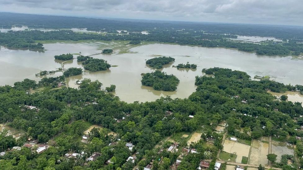 An aerial view shows flooded areas in Silchar in the north-eastern state of Assam