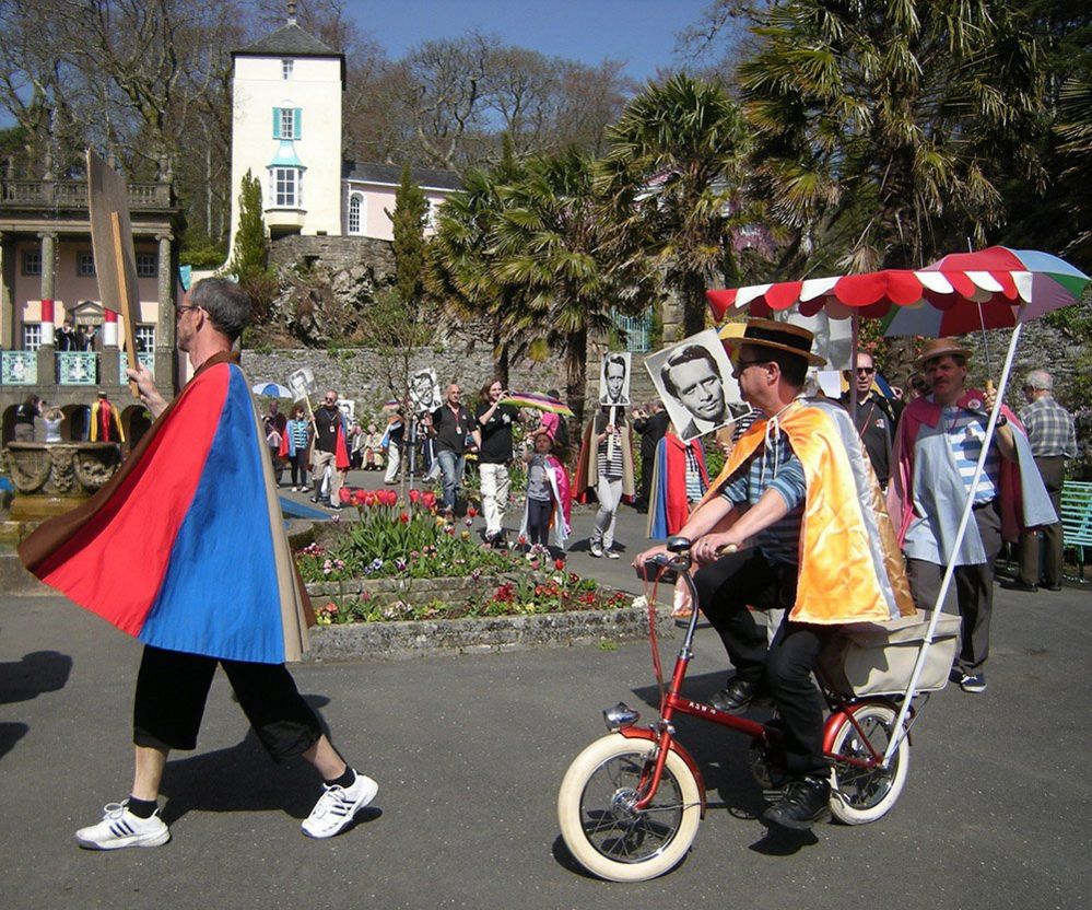 People at convention for The Prisoner television series parade in Portmeirion