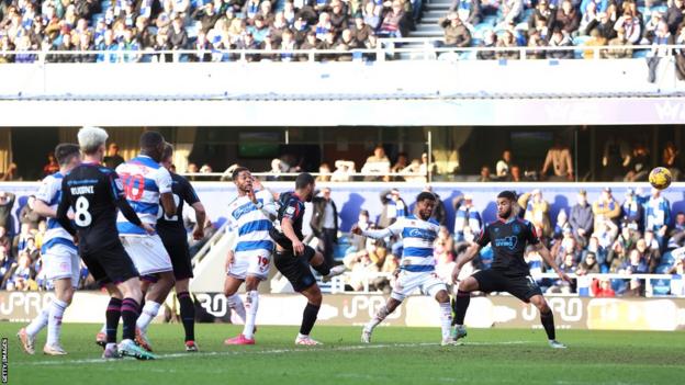 Kenneth Paal strikes the late goal for QPR against Huddersfield