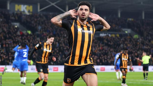 Ozan Tufan of Hull City celebrates the opening goal against Birmingham City