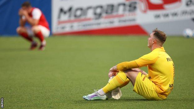 Rohan Ferguson dejected after Larne's defeat by St Joseph's