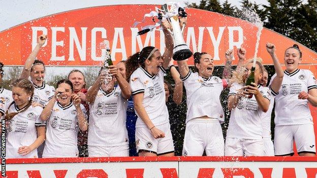 Swansea City celebrate winning last season's Adran Premier